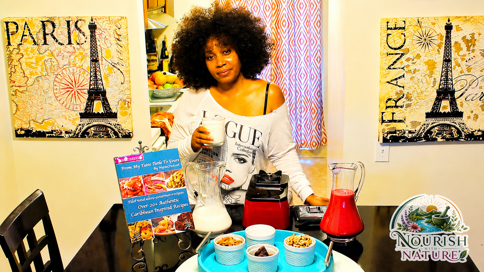 Angeline with cookbook and juices